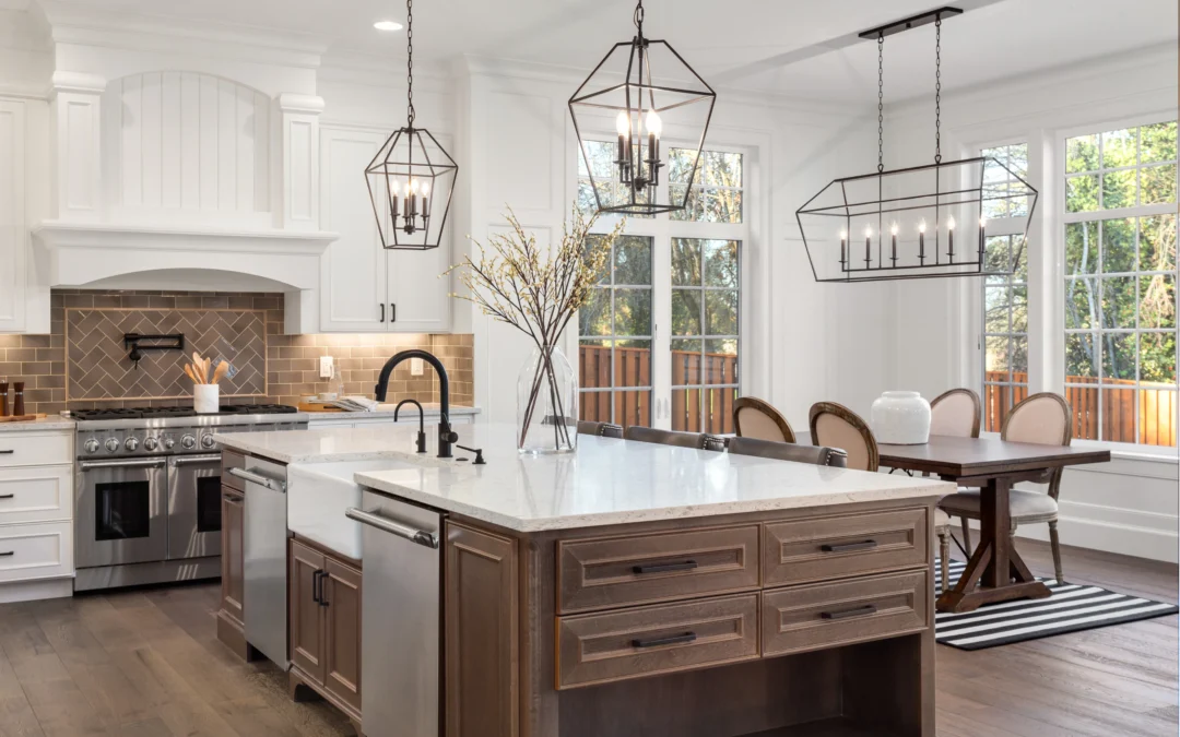 Modern open kitchen with hanging lights and large island